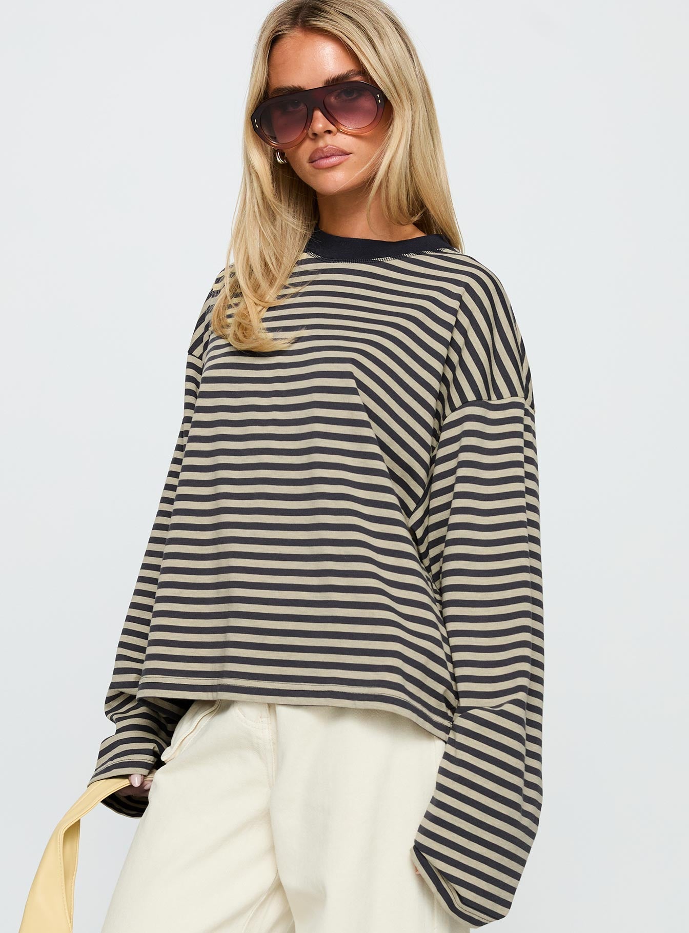 back view of model wearing Princess Polly Bloom Long Sleeve Top Beige Stripe Full Sleeves Crew Neck 
