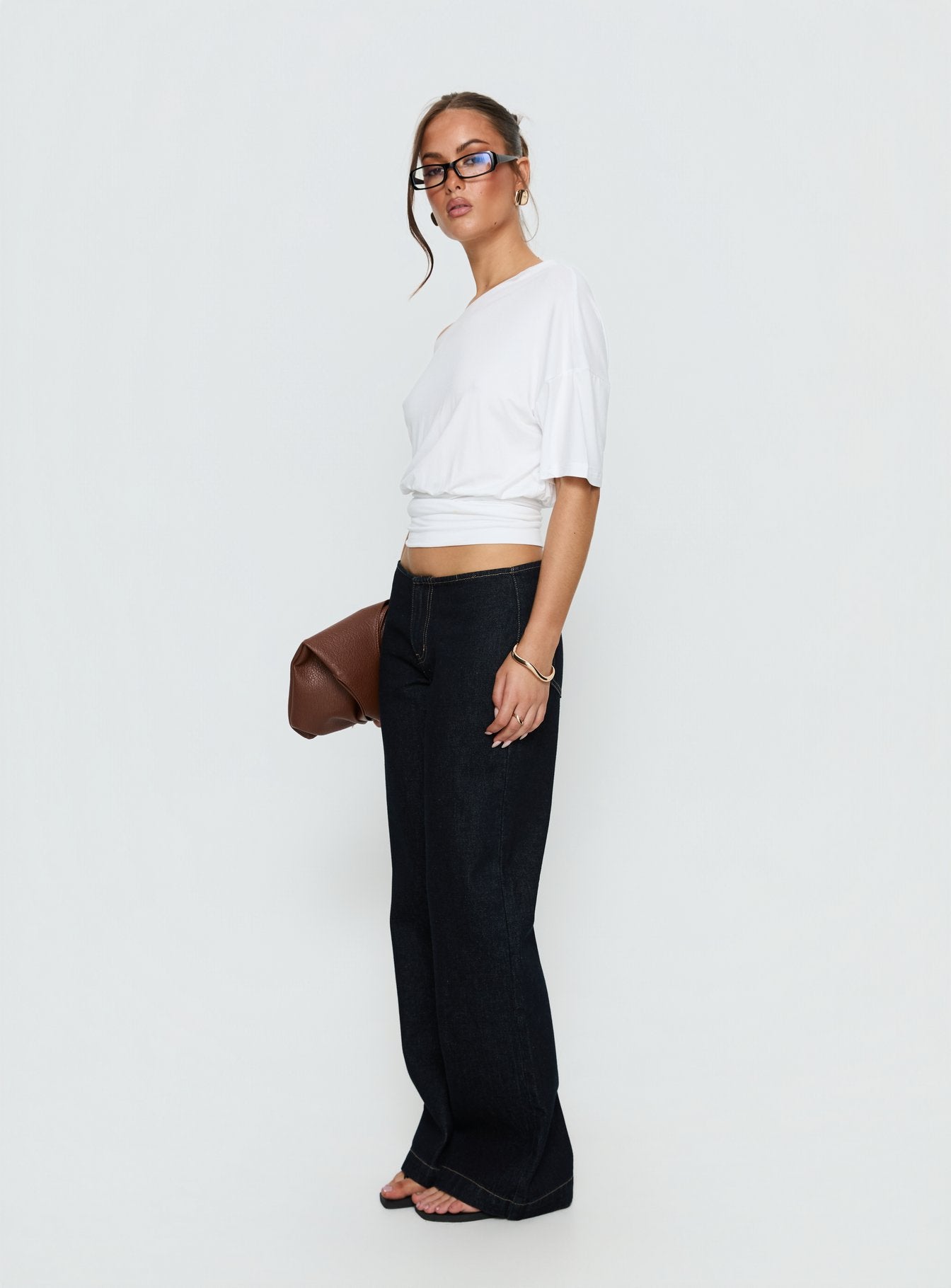 side view of model wearing Princess Polly Buenos No Waist Low Rise Straight Leg Jeans Raw Denim Mid Rise Jeans 