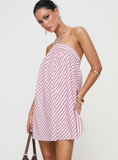 side view of model wearing Princess Polly Moonlit Mini Dress Pink Stripe Asymmetric Neckline 