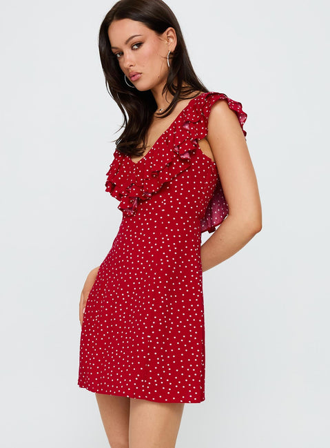 side view of model wearing Princess Polly Cherry Schnapps Flutter Mini Dress Red Polka V-Neck 