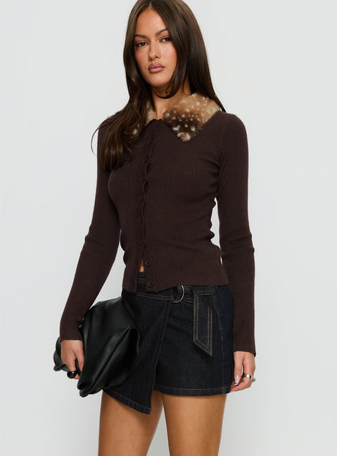   side view of model wearing Princess Polly Elinora Wrap Mini Skirt Raw Denim Mini Skirts 