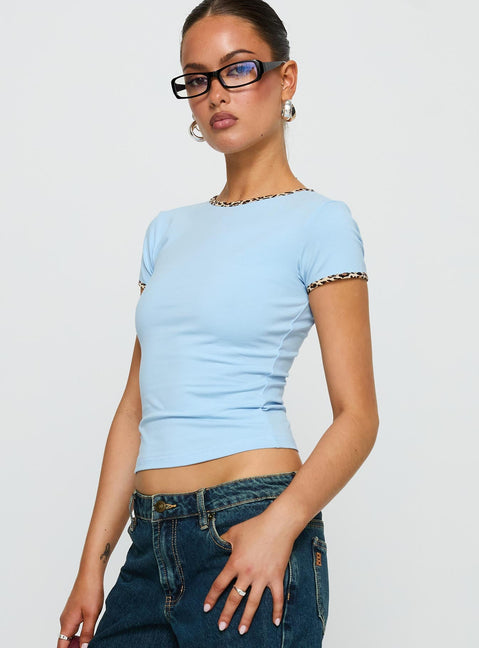 side view of model wearing Princess Polly Torissa Top Blue Short Sleeves Crew Neck 