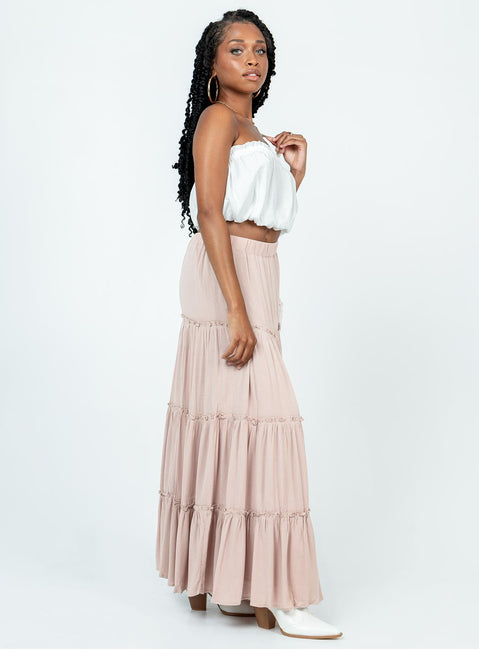  side view of model wearing Princess Polly Miriah Maxi Skirt Beige Maxi 