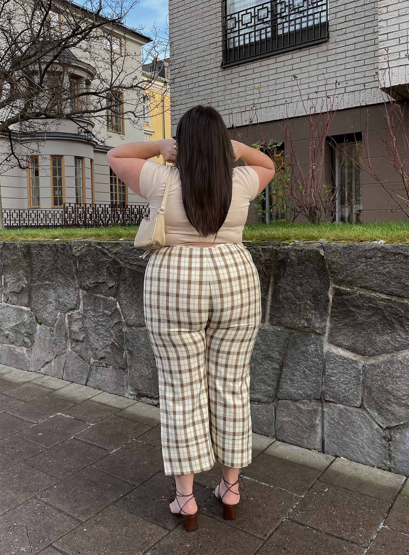 back view of model wearing Princess Polly Euros Pants Yellow Check Curve 