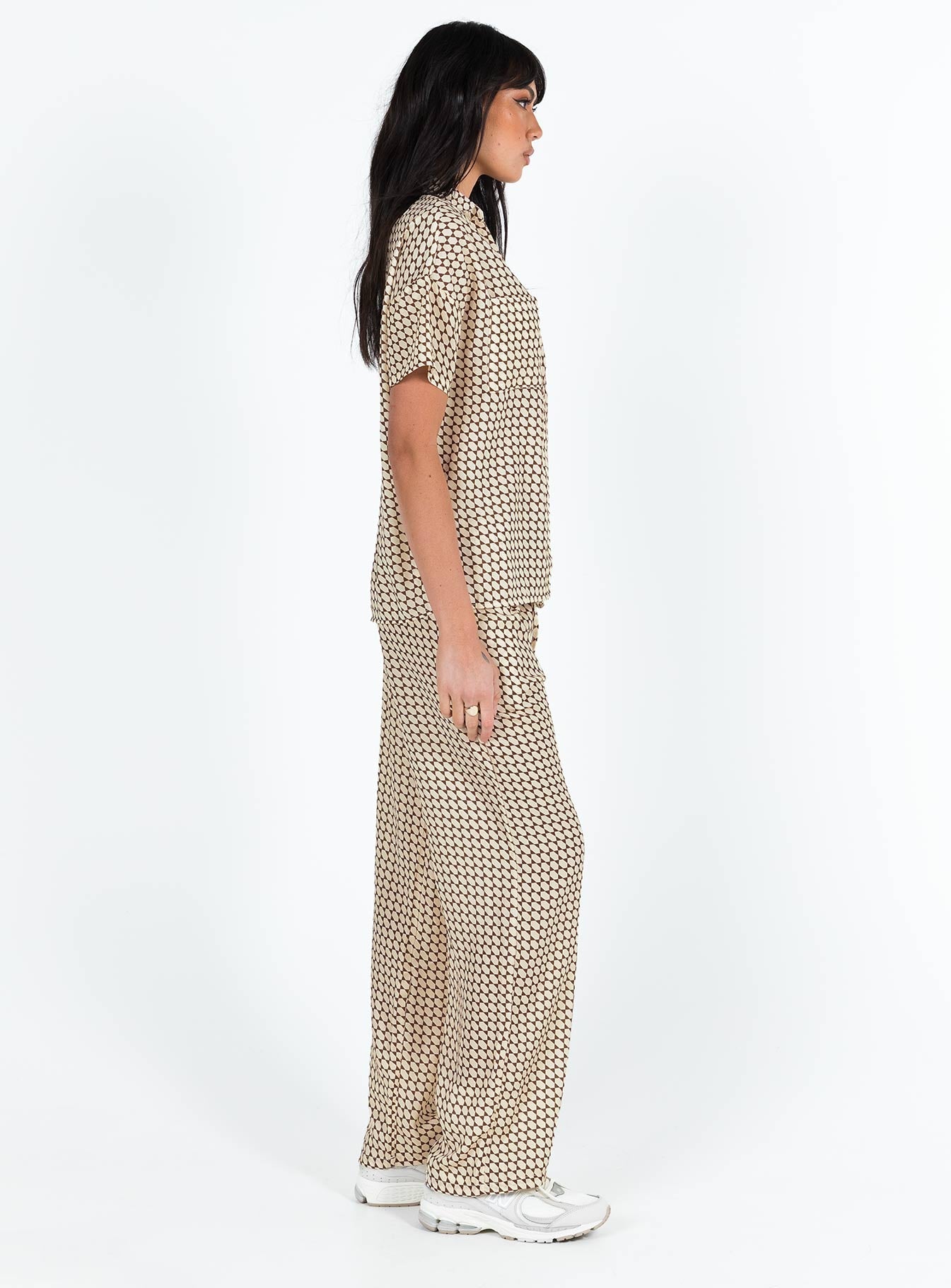 Matching set Geo print Short sleeve shirt Classic collar Button fastening at front Drop shoulder Twin front pockets Pants Elasticated waistband Twin hip pockets Wide leg 