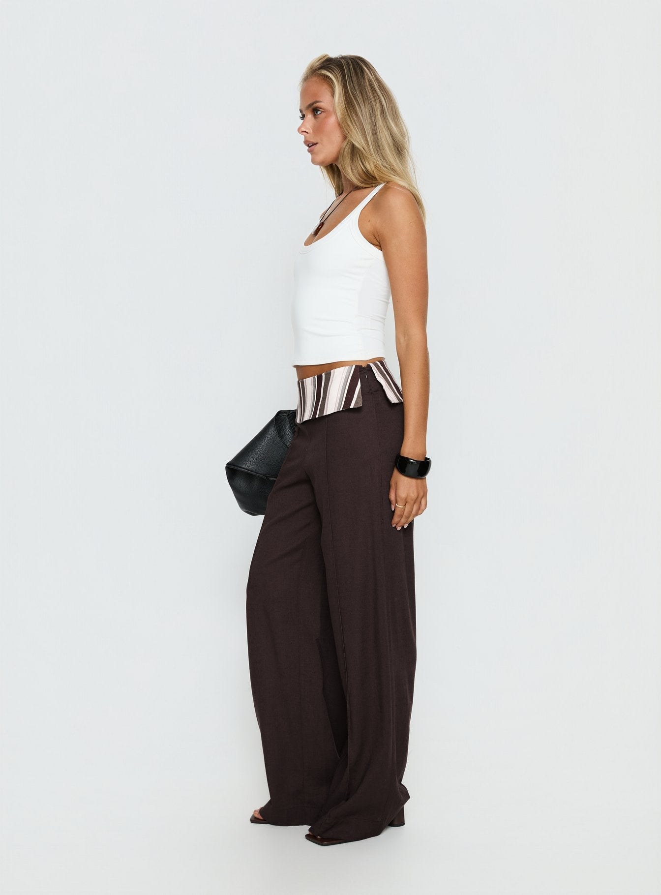 side view of model wearing Princess Polly Quenlin Folded Straight Leg Pant Multi Mid Rise Pants 