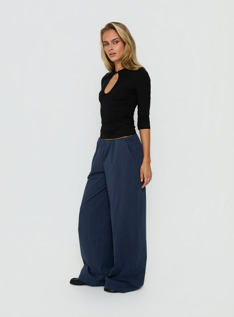Featuring the Lunea Concealed Waistband Pants Navy in womens-regular-pants with high-rise side view of model wearing Princess Polly