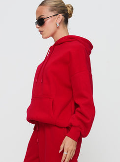 side view of model wearing Princess Polly Dream Fleece Classic Hoodie Red Long 