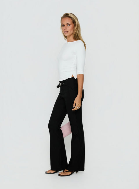 Featuring the Viridian Belted Flared Pants Black womens-regular-pants with high-rise waist on-body view of model wearing Princess Polly