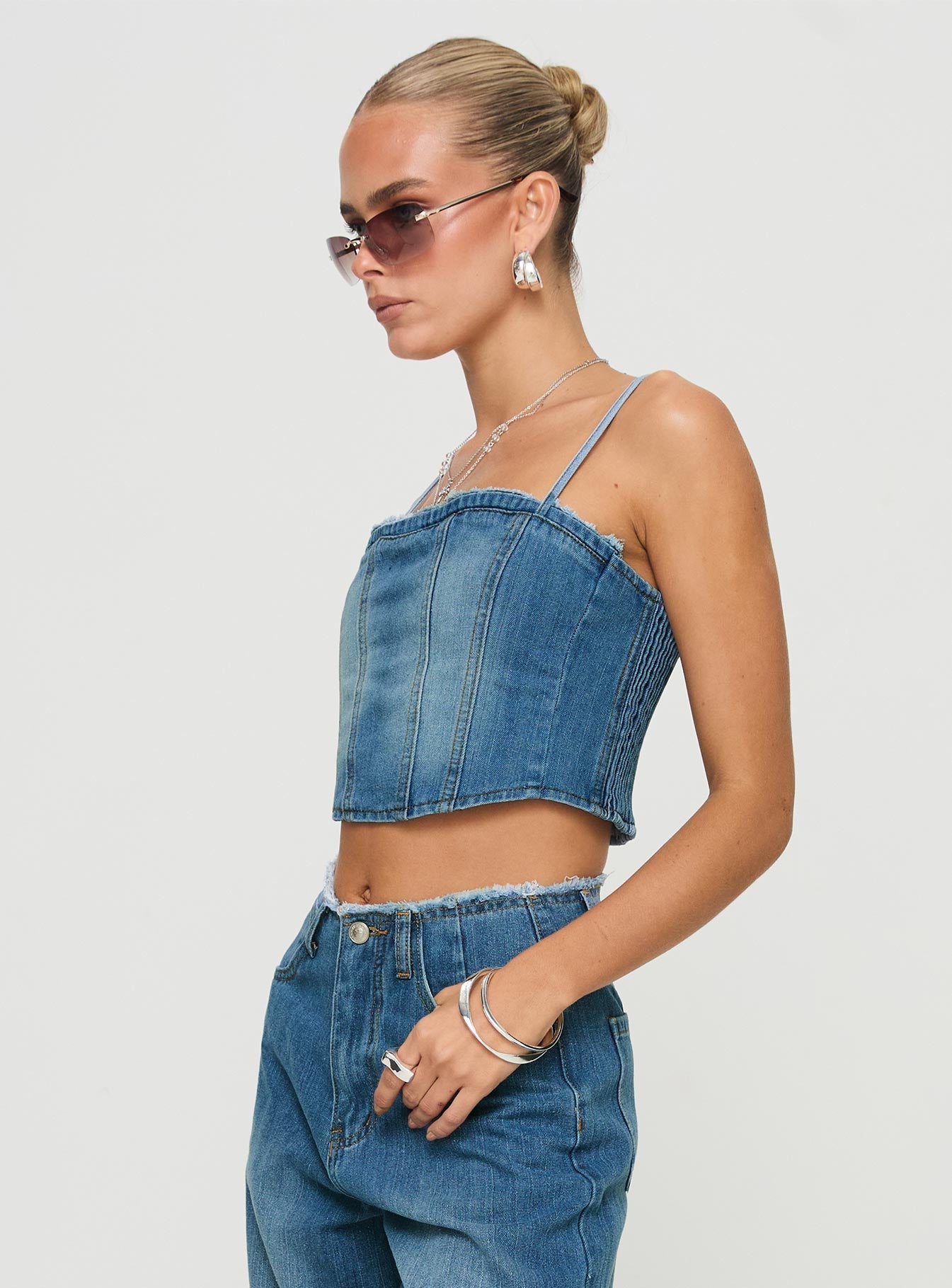 side view of model wearing Princess Polly Vihaan Top Blue Wash Sleeveless Square Neck 