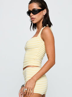 side view of model wearing Princess Polly Dreaming Of Me Top Yellow Stripe Sleeveless Sweetheart 