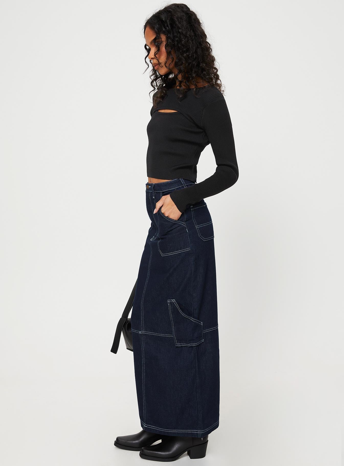   side view of model wearing Princess Polly Vine Maxi Skirt Blue Maxi 