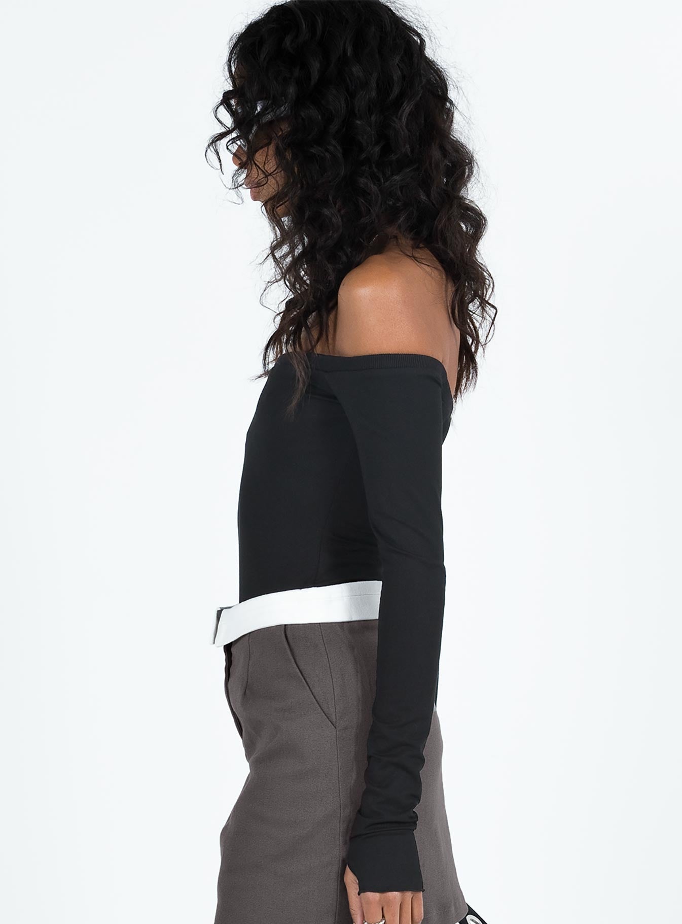 Long sleeve bodysuit Ribbed material Off the shoulder design Thumb holes at cuff G string style bottom Press clip fastening Good stretch Lined bust