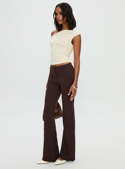 front view of model wearing Princess Polly Sportia Flare Pants Brown High Waisted Pants 
