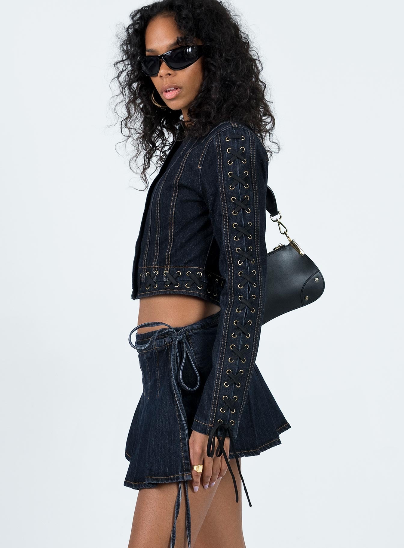 Front view of model wearing  front Camelia Pleat Mini Dark Denim Princess Polly  Mini Skirts 