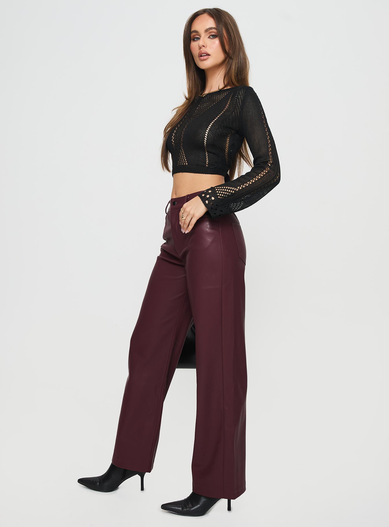 side view of model wearing Princess Polly Dempsey Faux Leather Pants Deep Cherry High Waisted Pants 