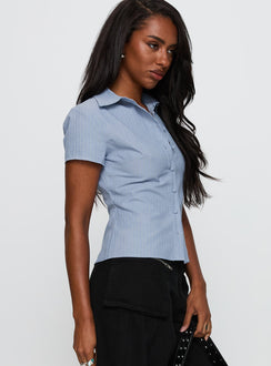 side view of model wearing Princess Polly Lift Off Button Up Top Blue Short Sleeves V-Neck 