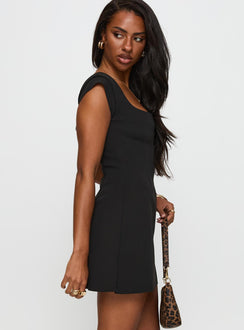 side view of model wearing Princess Polly Sylvette Mini Dress Black Sweetheart Neckline 