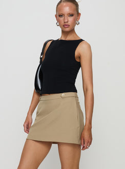   side view of model wearing Princess Polly Hosier Twill Mini Skirt Taupe Mini Skirts 