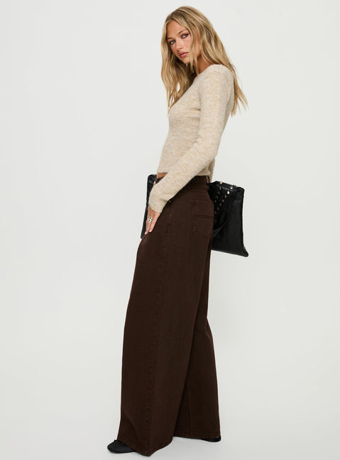 side view of model wearing Princess Polly Naylor Mid Rise Wide Leg Jeans Brown Mid Rise Jeans 