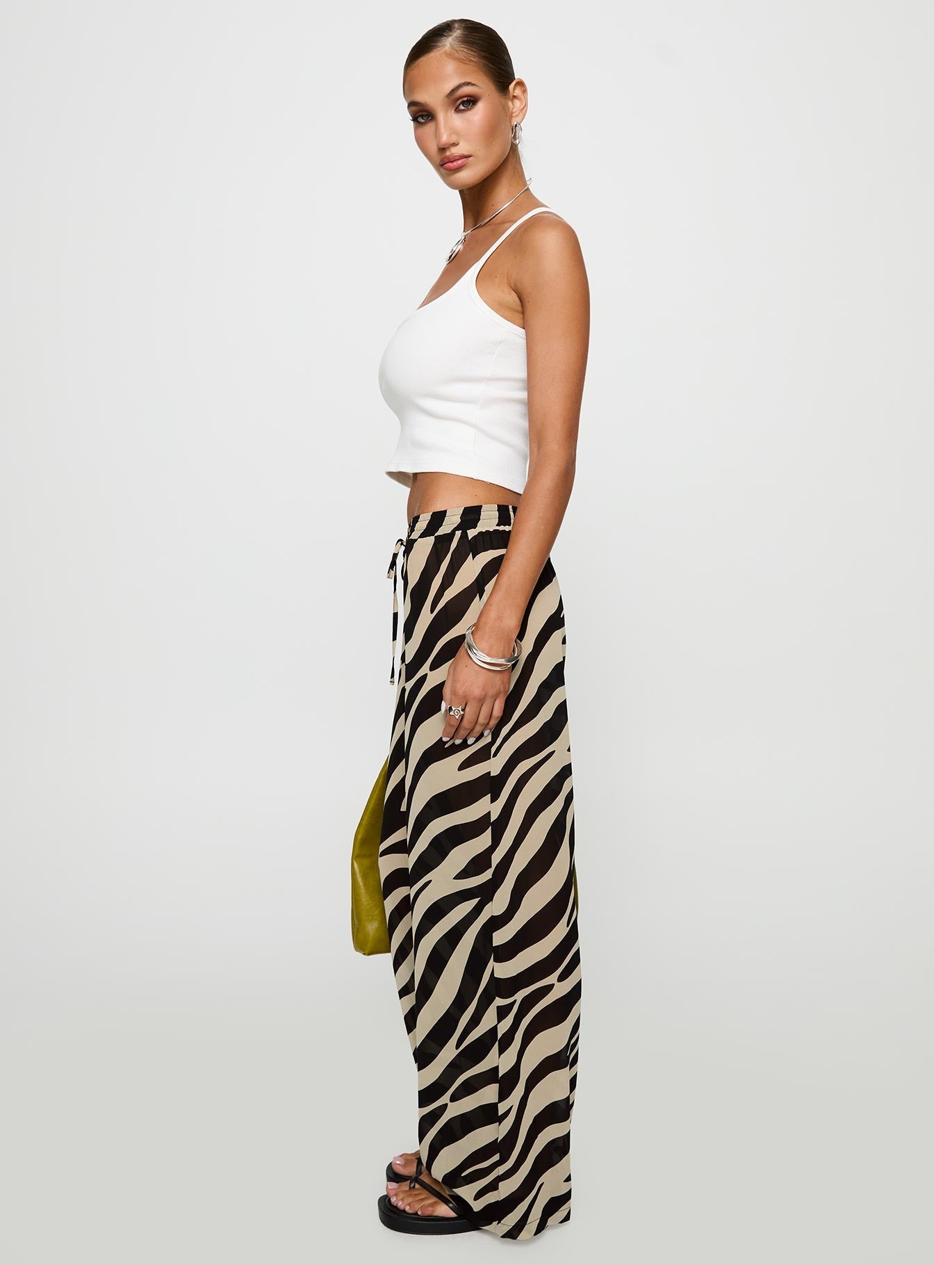 side view of model wearing Princess Polly Fyre Wide Leg Pant Zebra Low Rise Pants 