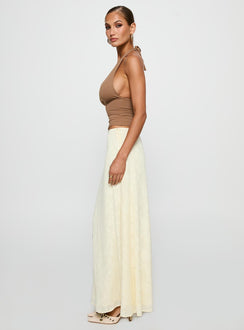   side view of model wearing Princess Polly Su Casa Low Waist Maxi Skirt Yellow Maxi 