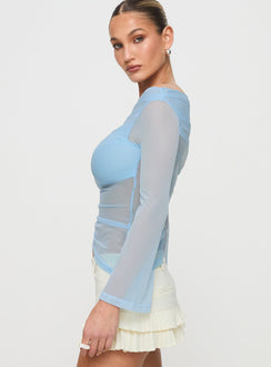 side view of model wearing Princess Polly Telescopic Off Shoulder Top Blue Full Sleeves straight 