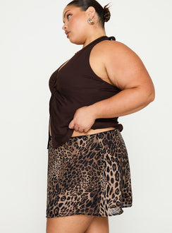   side view of model wearing Princess Polly Tejano Mini Skirt Leopard Curve Mini Skirts Skirts 