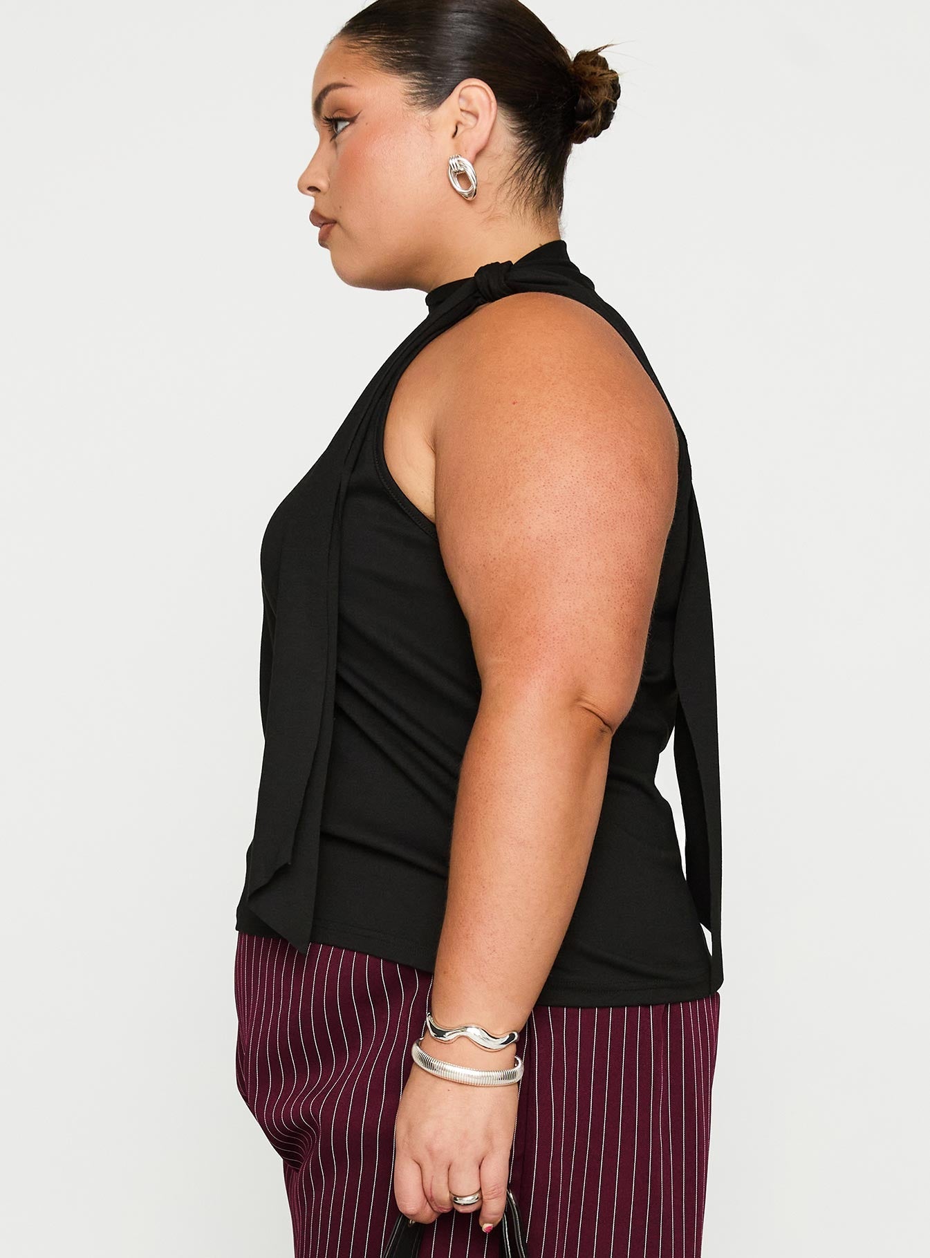 side view of model wearing Princess Polly Mathias Top Black Curve Sleeveless High Neck 