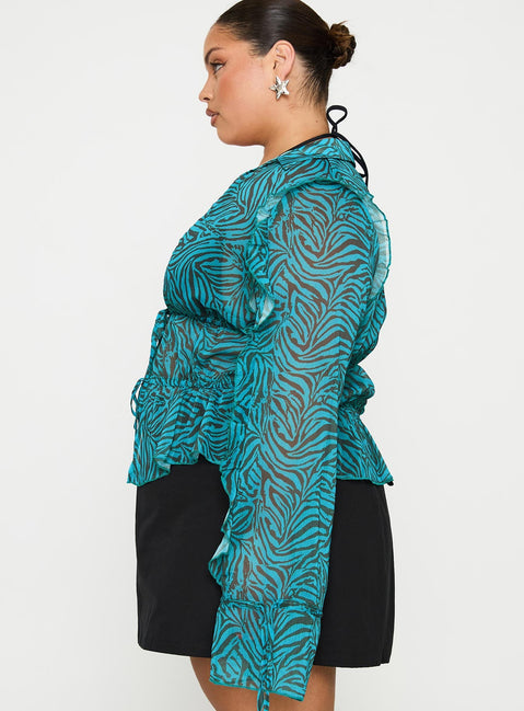 side view of model wearing Princess Polly Holidaze Long Sleeve Top Zebra Curve Full Sleeves Plunger 