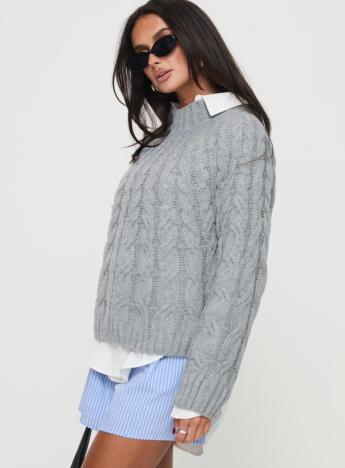 Cable knit sweater Turtle neck, ribbed trim detail Slight stretch, unlined 
