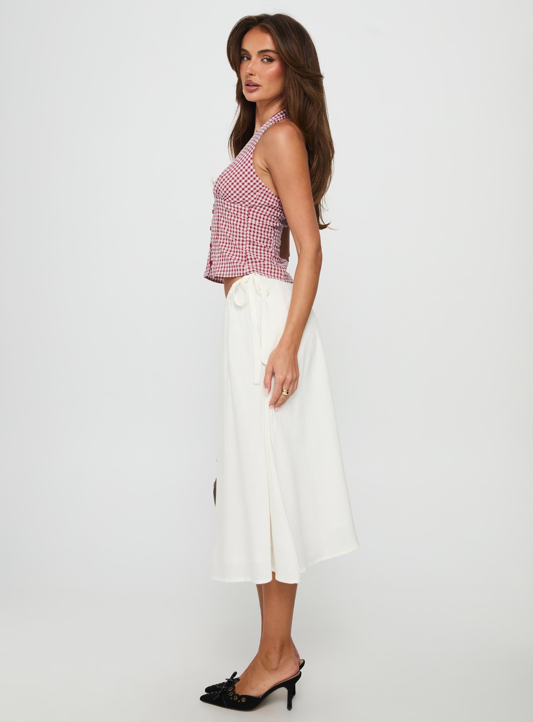   side view of model wearing Princess Polly Persuasion Tie Side Midi Skirt White Midi Skirts 
