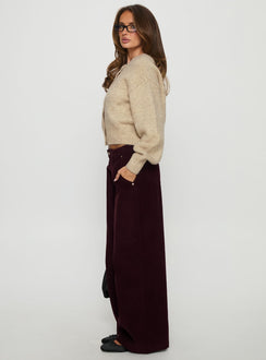 side view of model wearing Princess Polly Jacynda Low Waist Wide Leg Corduroy Jeans Currant Mid Rise Jeans 