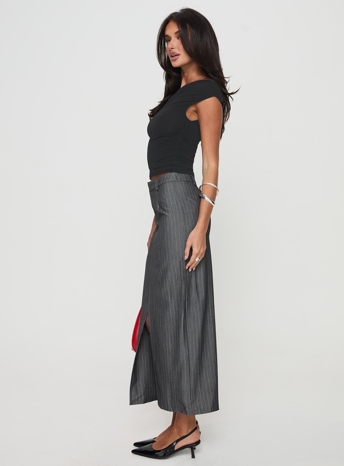   side view of model wearing Princess Polly Cubeb Maxi Skirt Grey 