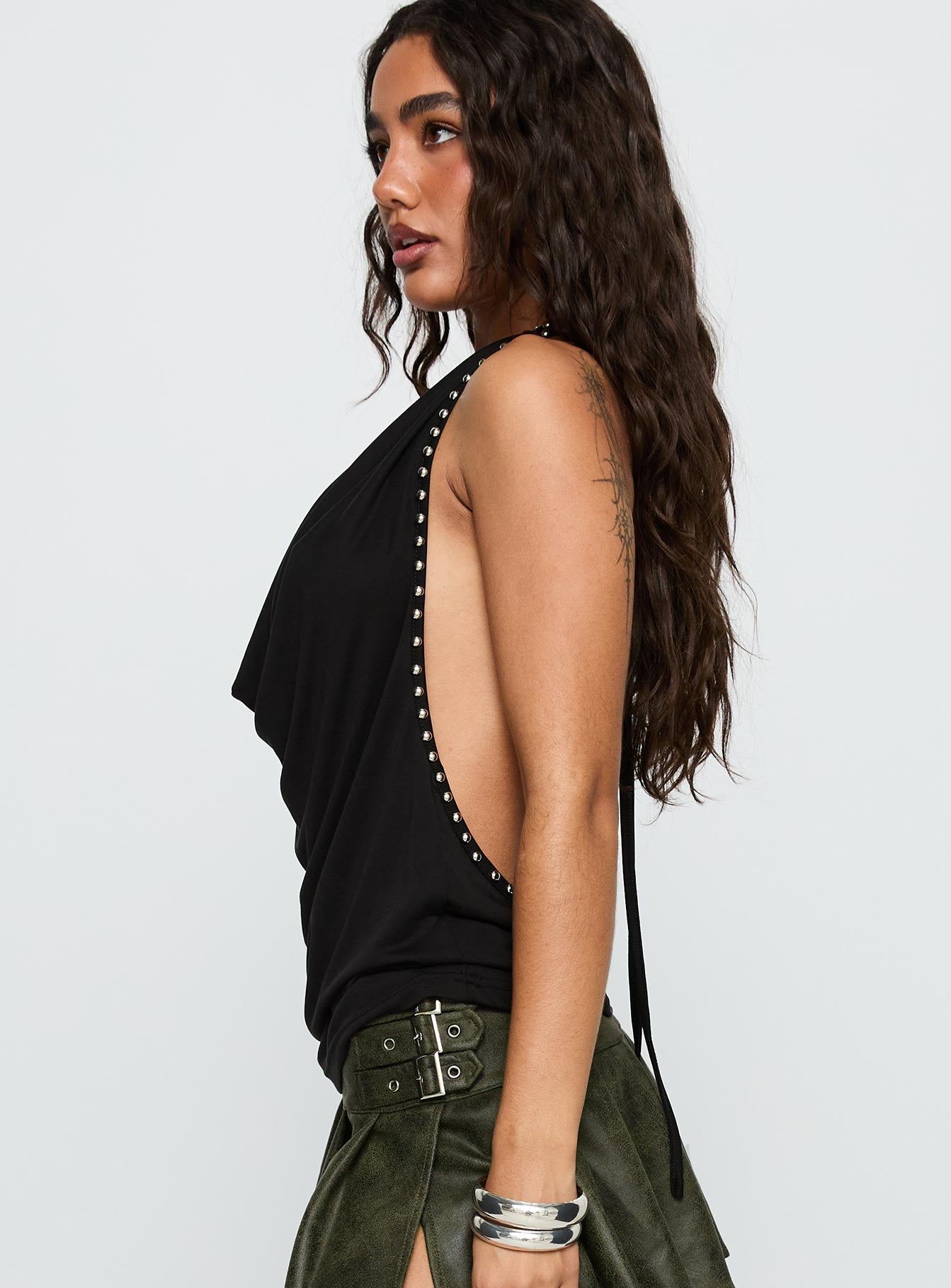 side view of model wearing Princess Polly Khoda Studded Halter Top Black Sleeveless Cowl 