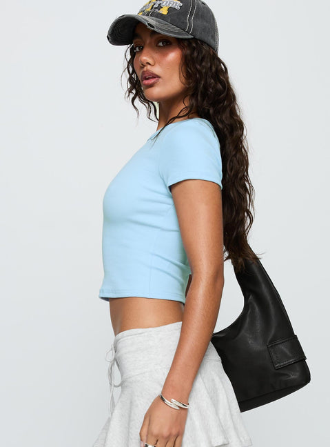side view of model wearing Princess Polly Baseline Scoop Rib Tee Light Blue Short Sleeves Crew Neck 