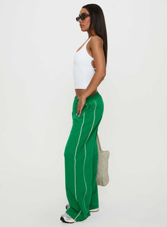side view of model wearing Princess Polly Field Day Track Pants Green High Waisted Pants 