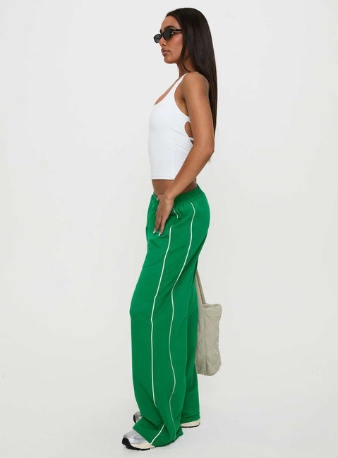 side view of model wearing Princess Polly Field Day Track Pants Green High Waisted Pants 