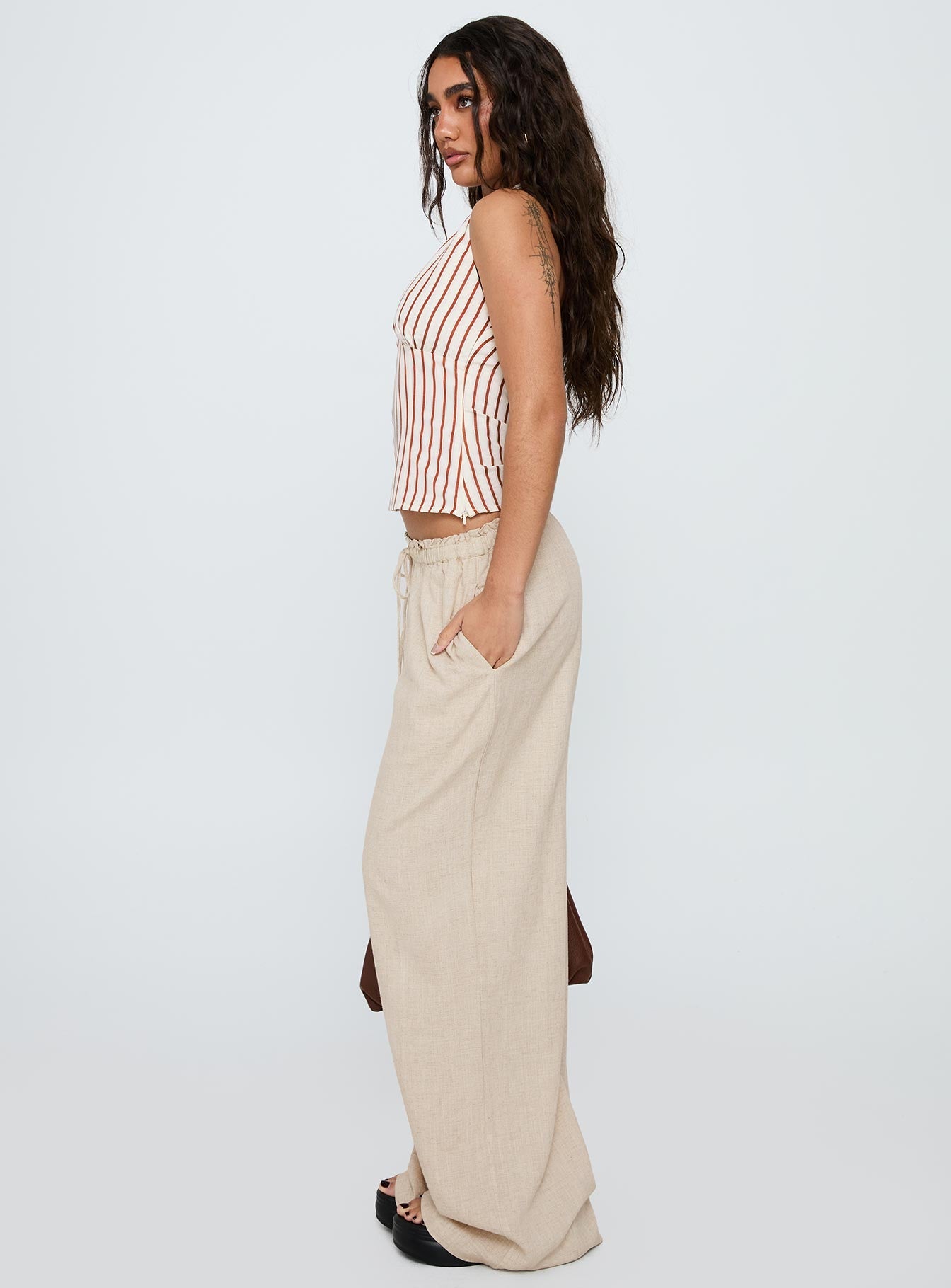 side view of model wearing Princess Polly Seascape Oversize Tie Pants Natural High Waisted Pants 