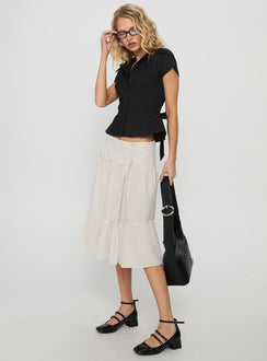   side view of model wearing Princess Polly Cascades Low Rise Midi Skirt Beige / White Stripe Midi Skirts 