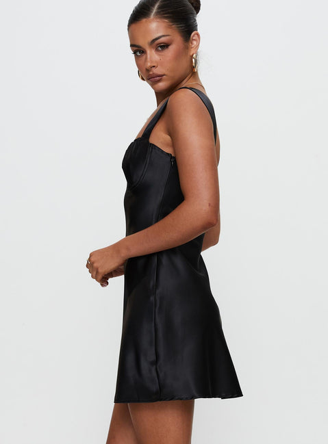 side view of model wearing Princess Polly Tremont Mini Dress Black Sweetheart Neckline 