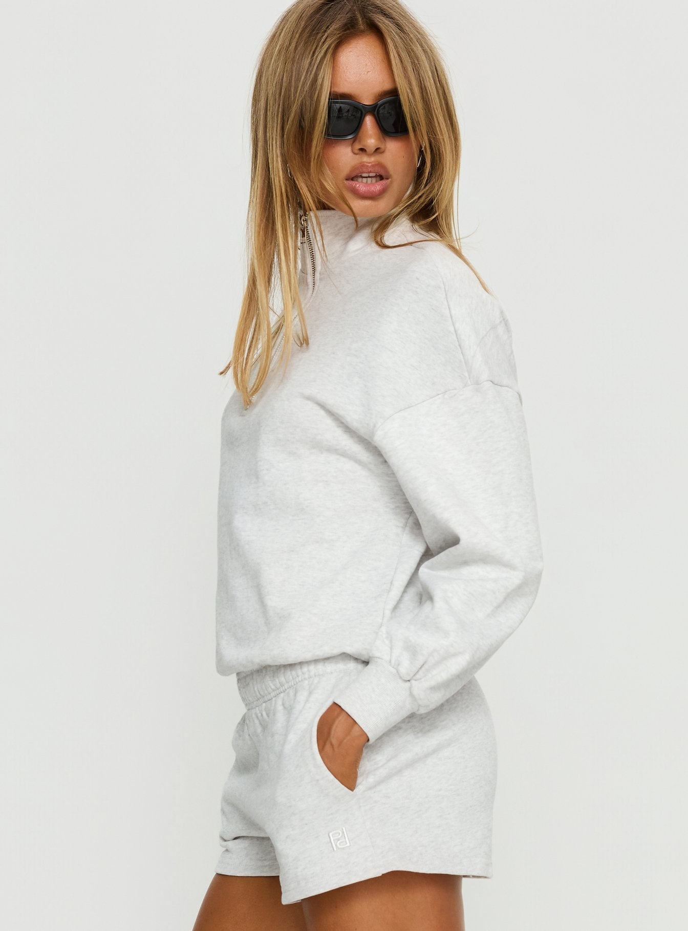 side view of model wearing Princess Polly Rozanna 1/4 Zip Jumper Grey Marle 