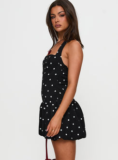 side view of model wearing Princess Polly Gigli Bubble Hem Mini Dress Polka Dot Square Neck 