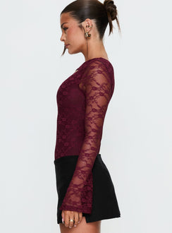 side view of model wearing Princess Polly Macaria Long Sleeve Lace Bodysuit Red Long Sleeve Tops Bodysuit 