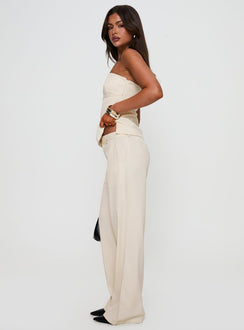back view of model wearing Princess Polly Irresistible Wide Leg Pant Cream Petite High Waisted Pants 