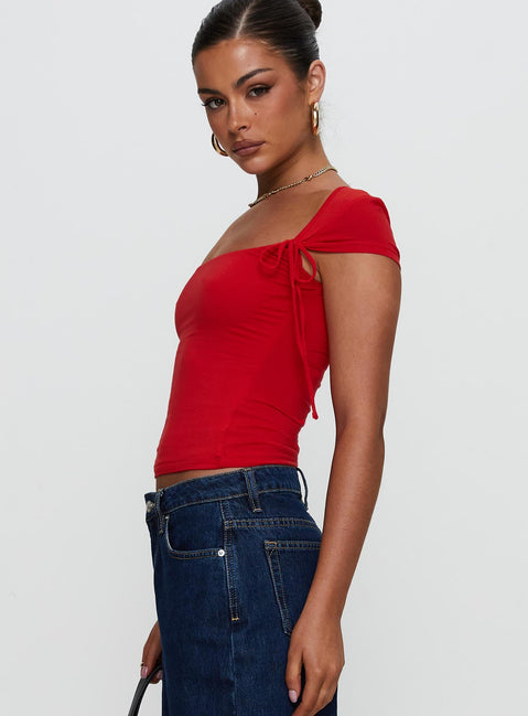 side view of model wearing Princess Polly Daena Tie Detail Top Red Short Sleeves Square Neck 