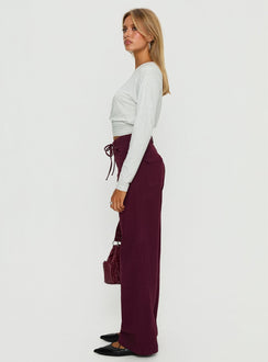 side view of model wearing Princess Polly Bruiser Tie Waist Mid Rise Wide Leg Jeans Currant High Rise Jeans Jeans 