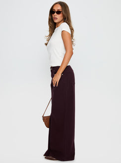 side view of model wearing Princess Polly Big News Mid Rise Wide Leg Jeans Currant Mid Rise Jeans 