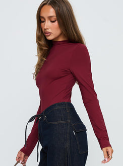 side view of model wearing Princess Polly Augustness Long Sleeve Bodysuit Burgundy Long Sleeve Tops 