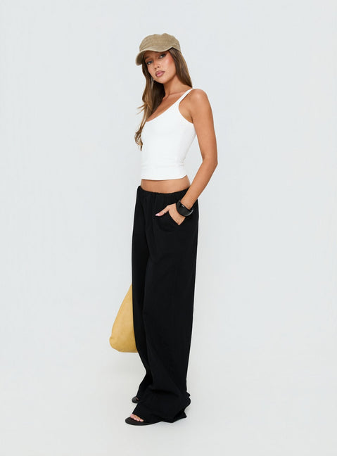 Showcasing Lunea Concealed Waistband Pants Black in womens-regular-pants with high-rise front view of model wearing Princess Polly